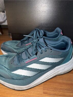 adidas Women's Teal Athletic Shoes with White Stripes and Pink Accents